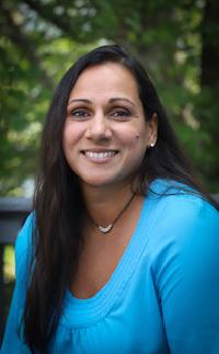 Headshot of Amisha Parekh De Campos